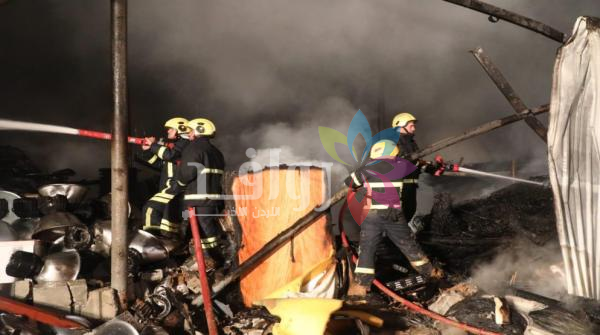 13 إصابة جراء حريق هنجر بهارات في إربد